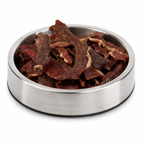 Sliced pork loin treats close-up, human grade single ingredient dog treat